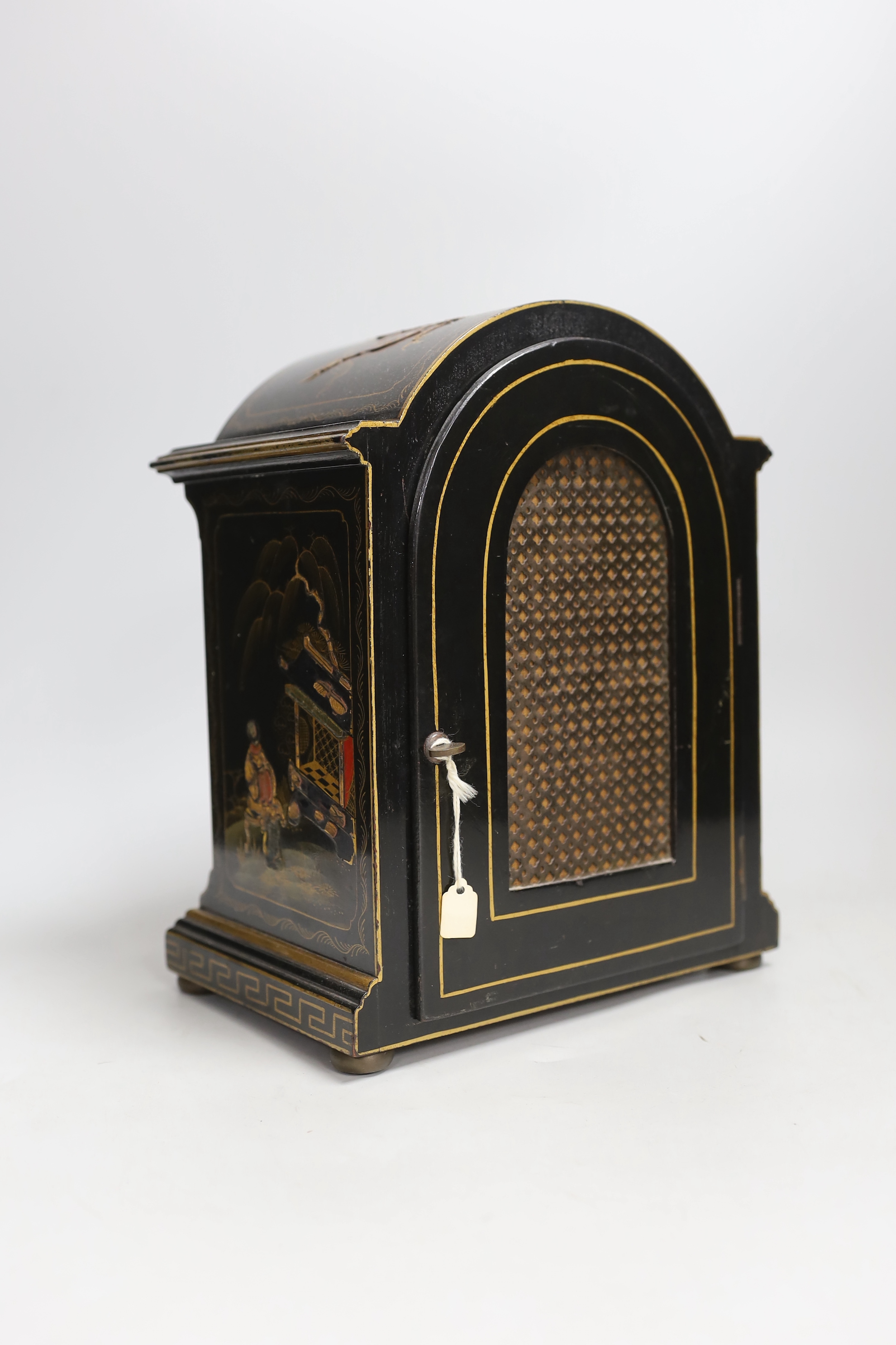 A reproduction chinoiserie cased mantel clock marked Tempus Fugit, 26cm